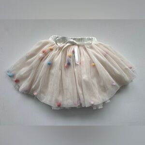 Rock Your Kid Baby Girl’s Tutu style skirt with colorful Pom Poms | Size 2Y.